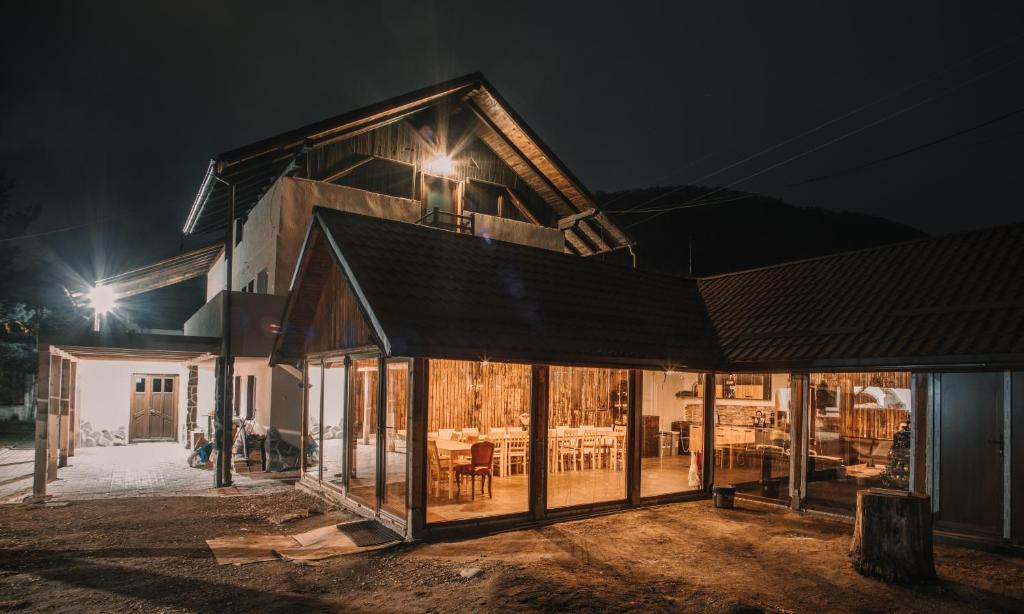 a house under construction at night at Vama veche de la Bran in Bran