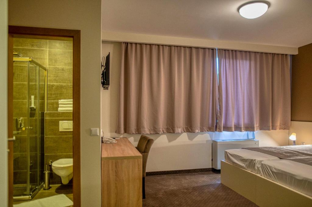 Koupelna v ubytování Hotel Argentum