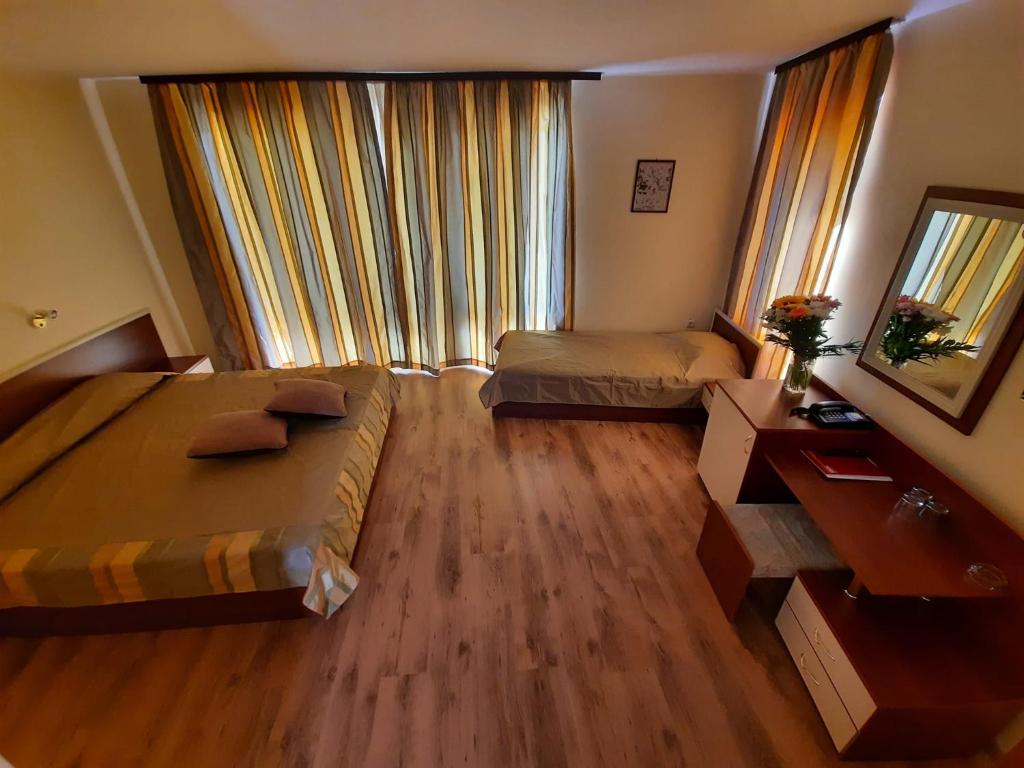 Postel nebo postele na pokoji v ubytování Hotel Veris