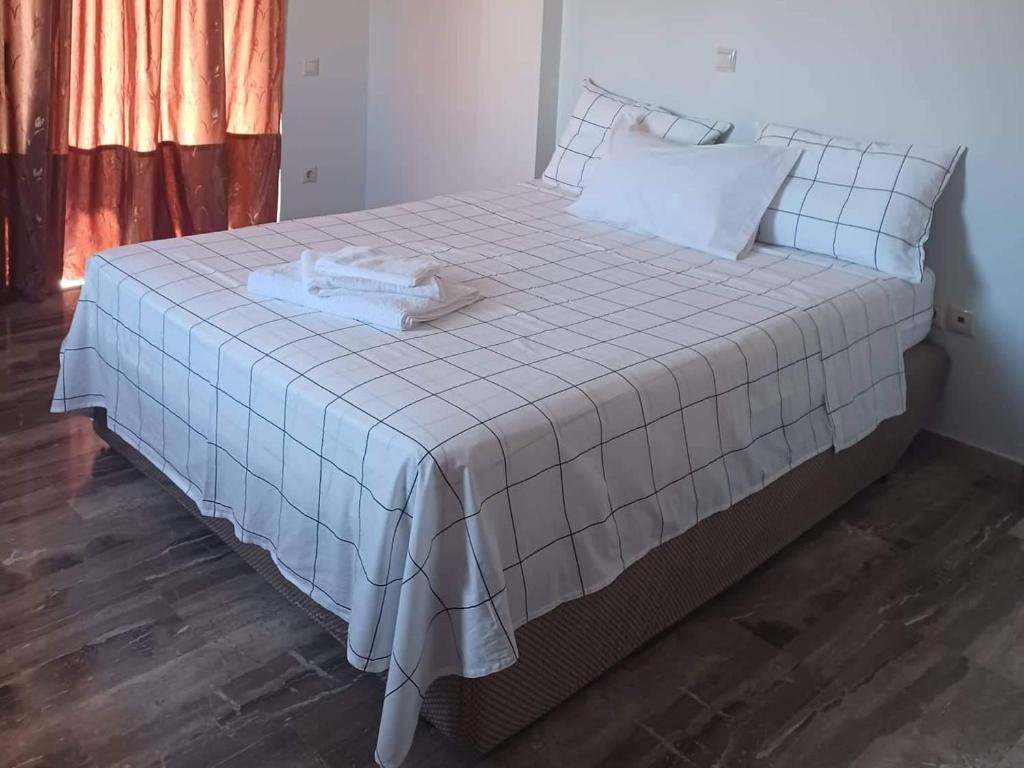 Posteľ alebo postele v izbe v ubytovaní Glyfada-Elliniko