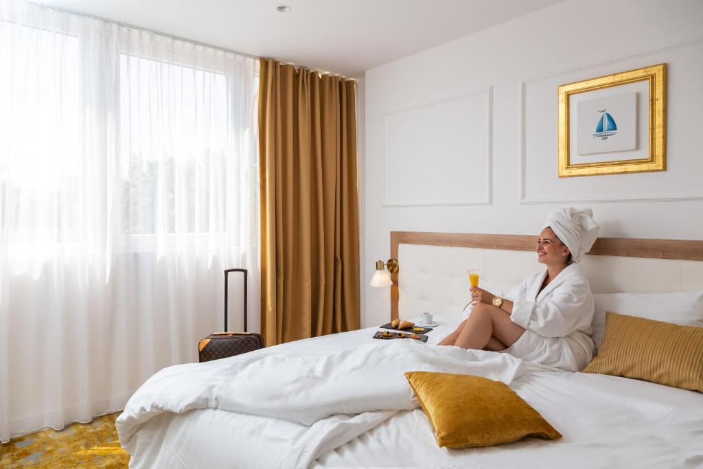 Krevet ili kreveti u jedinici u objektu Hotel Corner