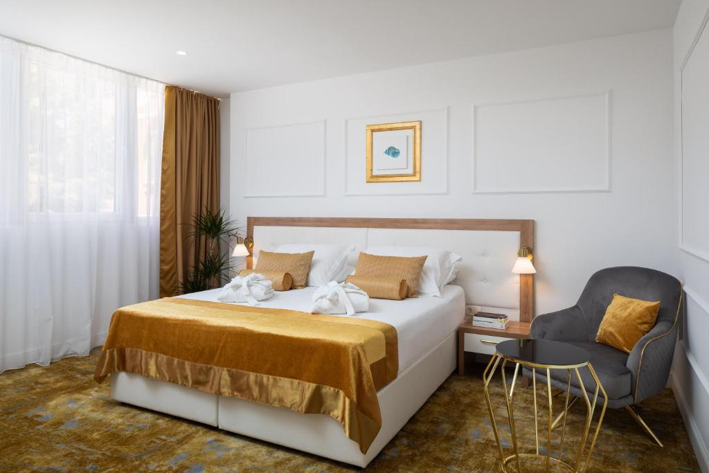 Krevet ili kreveti u jedinici u objektu Hotel Corner