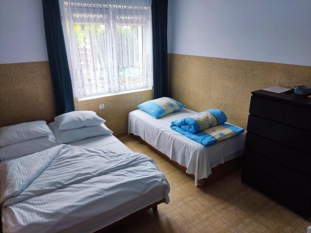 Posteľ alebo postele v izbe v ubytovaní Willa Zefirek
