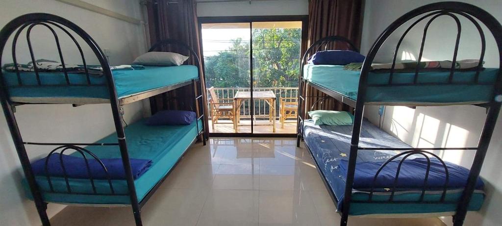 Postel nebo postele na pokoji v ubytování P & T Hostel