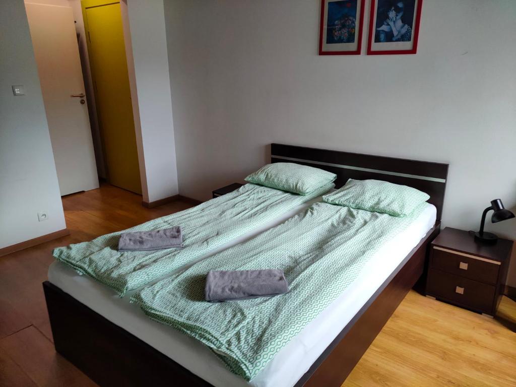 Postel nebo postele na pokoji v ubytování Lux Hostel - z prywatnymi łazienkami