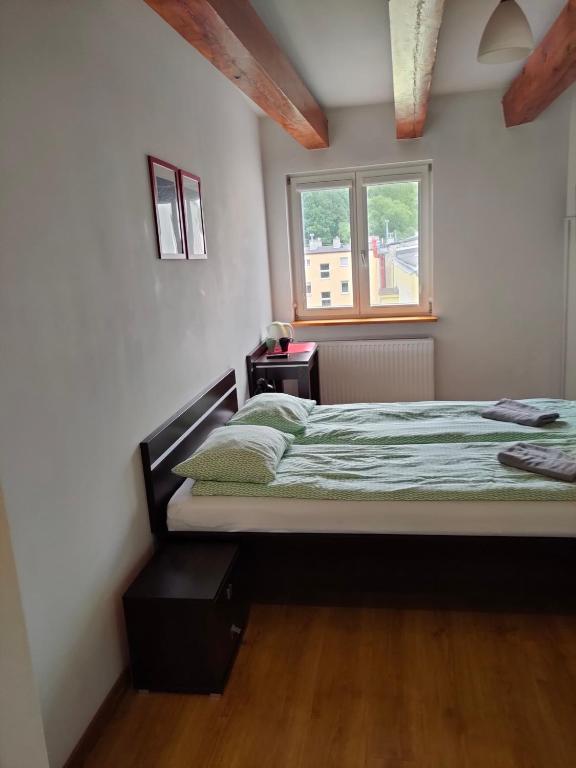 Postel nebo postele na pokoji v ubytování Lux Hostel - z prywatnymi łazienkami
