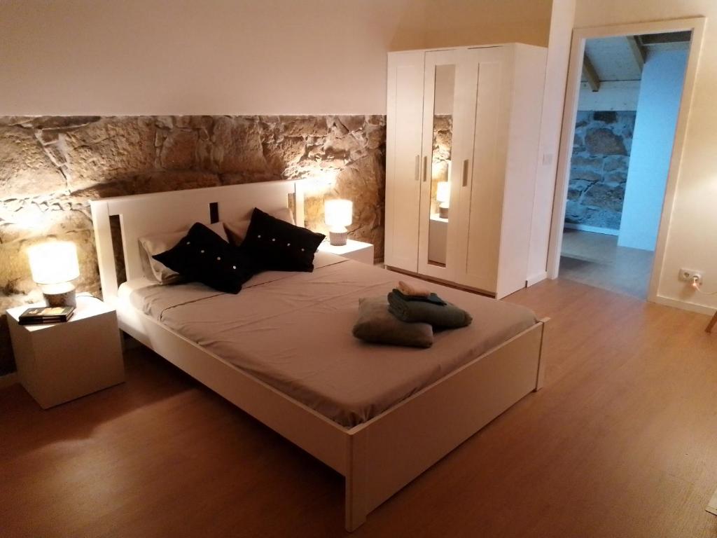 Cama ou camas em um quarto em Casa da Florbela