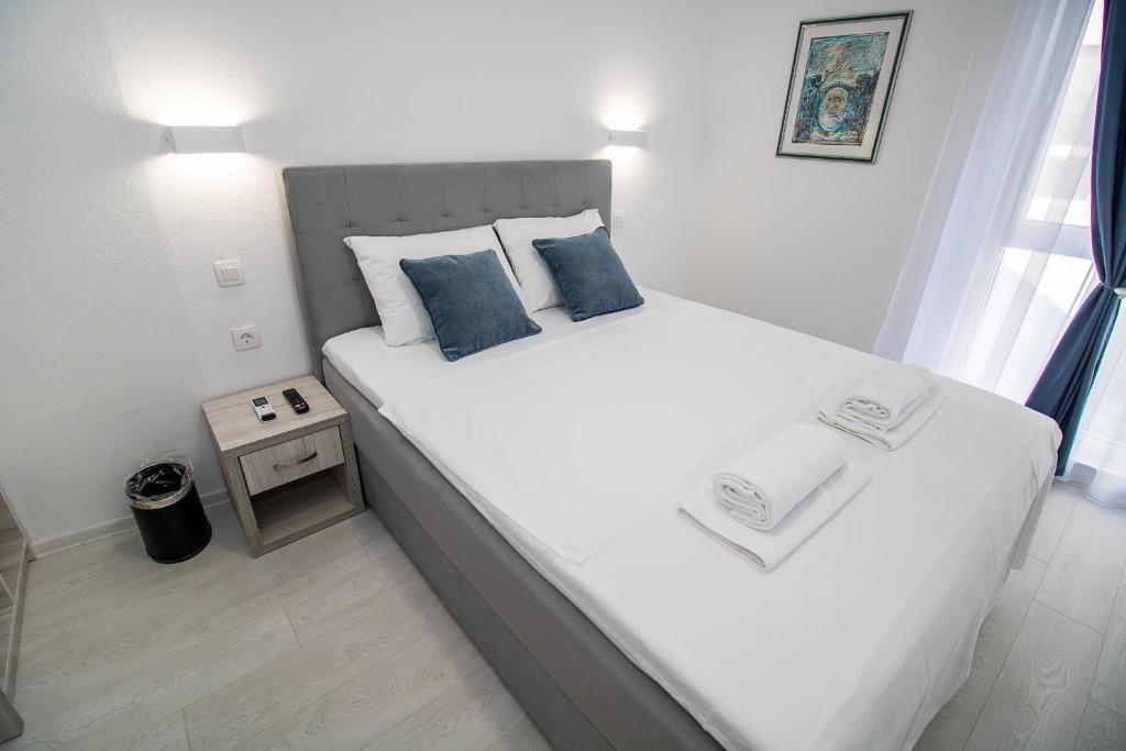 Postel nebo postele na pokoji v ubytování Villa Sonata