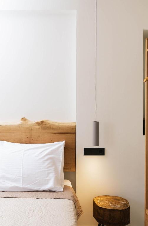 Postel nebo postele na pokoji v ubytování Luxury Villas Ammos in Style