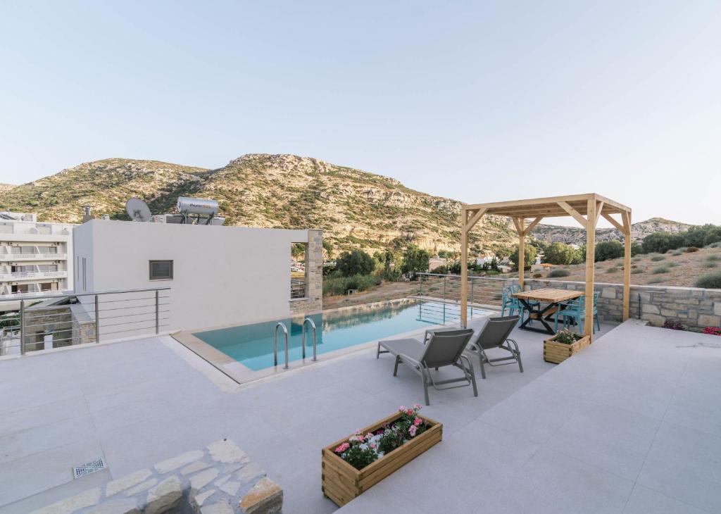 Bazén v ubytování Luxury Villas Ammos in Style nebo v jeho okolí