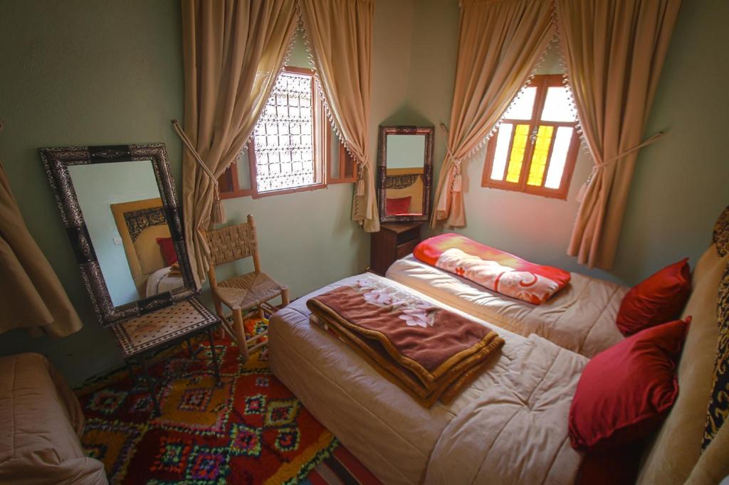 Postel nebo postele na pokoji v ubytování Gîte Atlas Mazik
