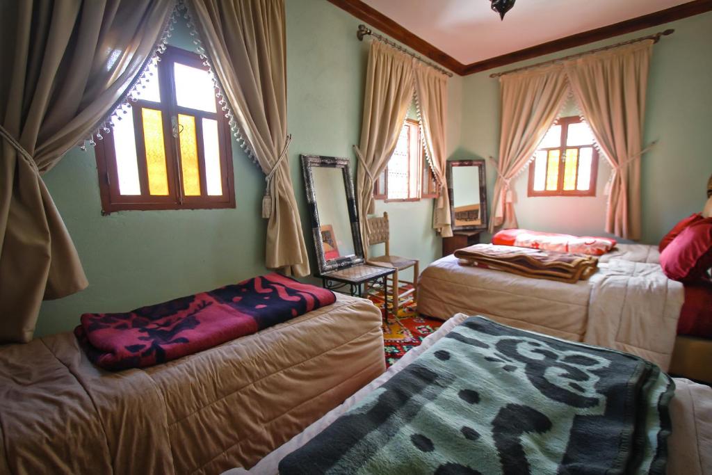 Postel nebo postele na pokoji v ubytování Gîte Atlas Mazik