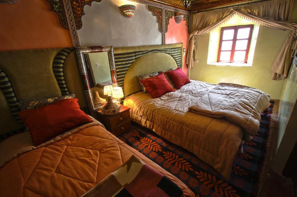 Postel nebo postele na pokoji v ubytování Gîte Atlas Mazik