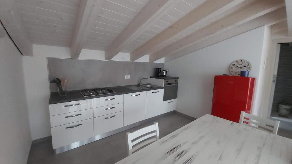 Kuchyň nebo kuchyňský kout v ubytování OLEANDRA ROSSA
