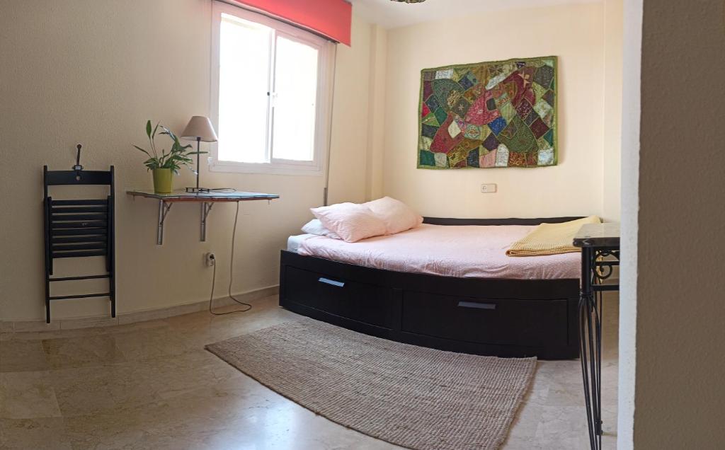 Posteľ alebo postele v izbe v ubytovaní Confortable habitación céntrica en piso privado