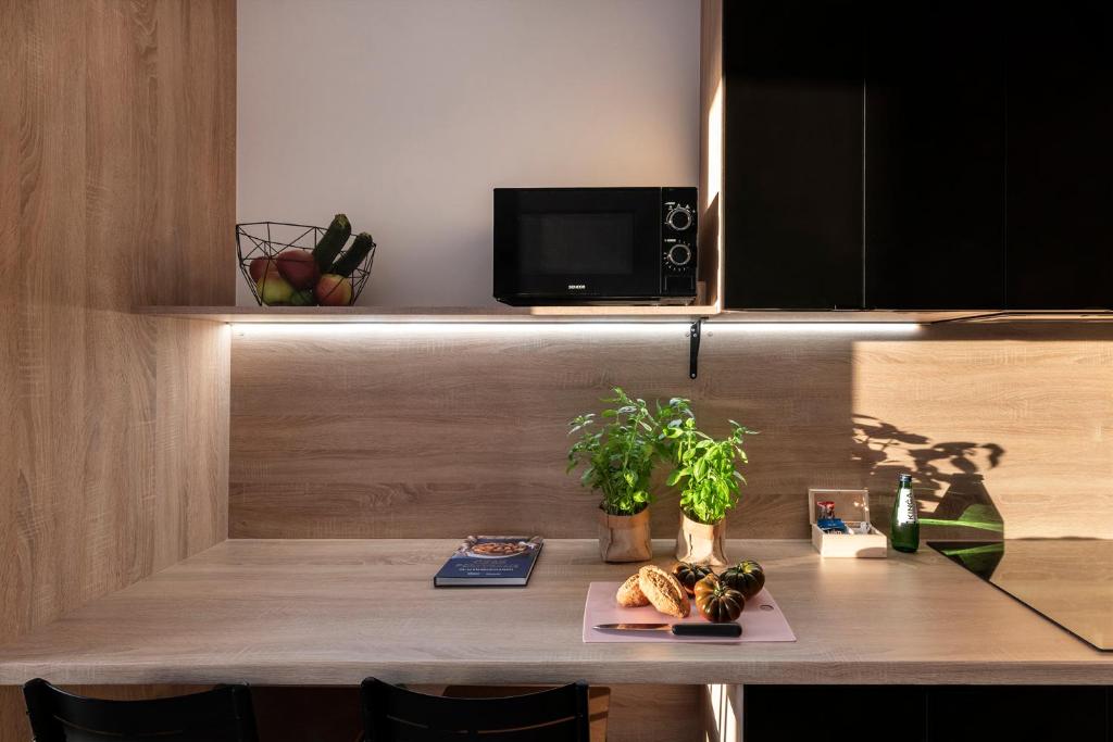 Televízia a/alebo spoločenská miestnosť v ubytovaní ShortStayPoland Pileckiego