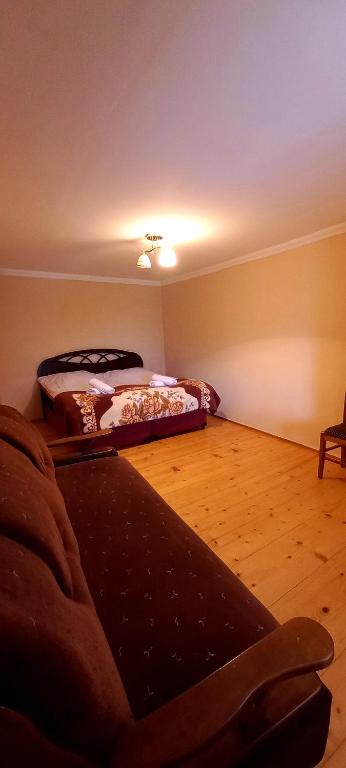 Postel nebo postele na pokoji v ubytování Bees Guesthouse