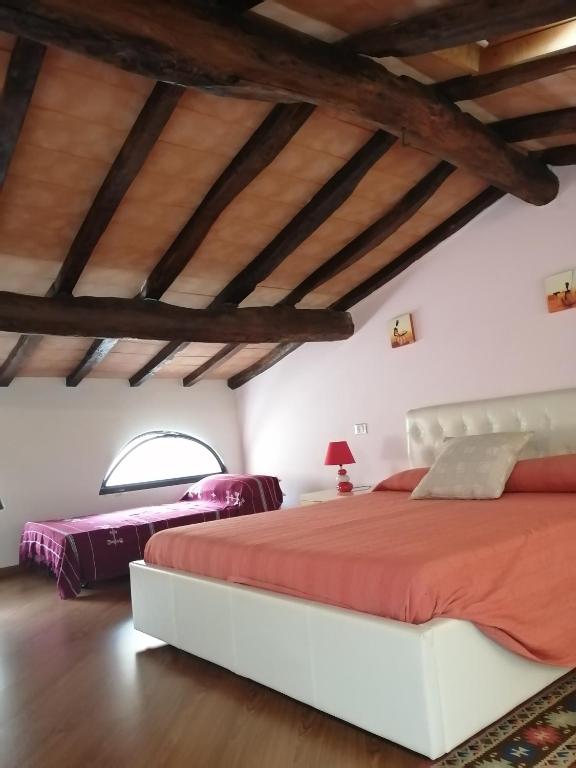 Posteľ alebo postele v izbe v ubytovaní A CA' DI GIO'