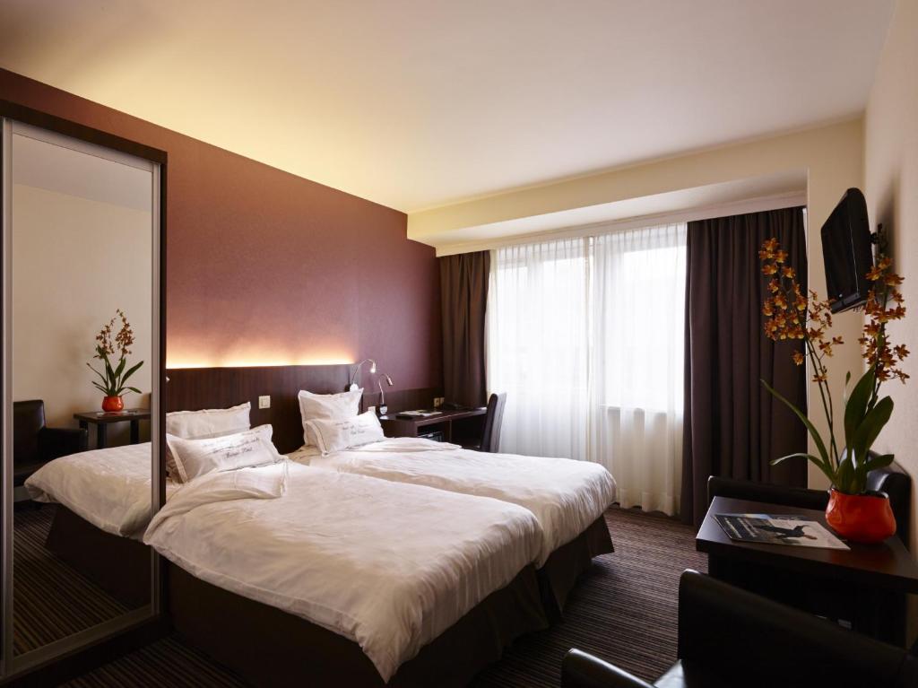 Postel nebo postele na pokoji v ubytování Hotel Europe