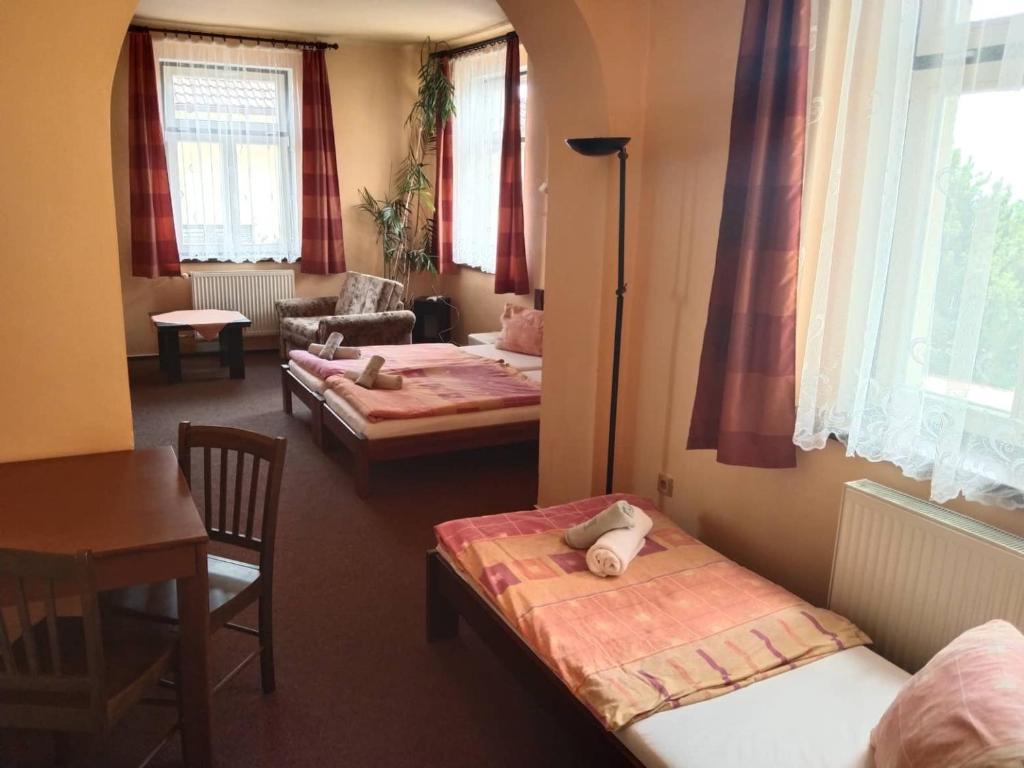 Postel nebo postele na pokoji v ubytování Hotel Jaro