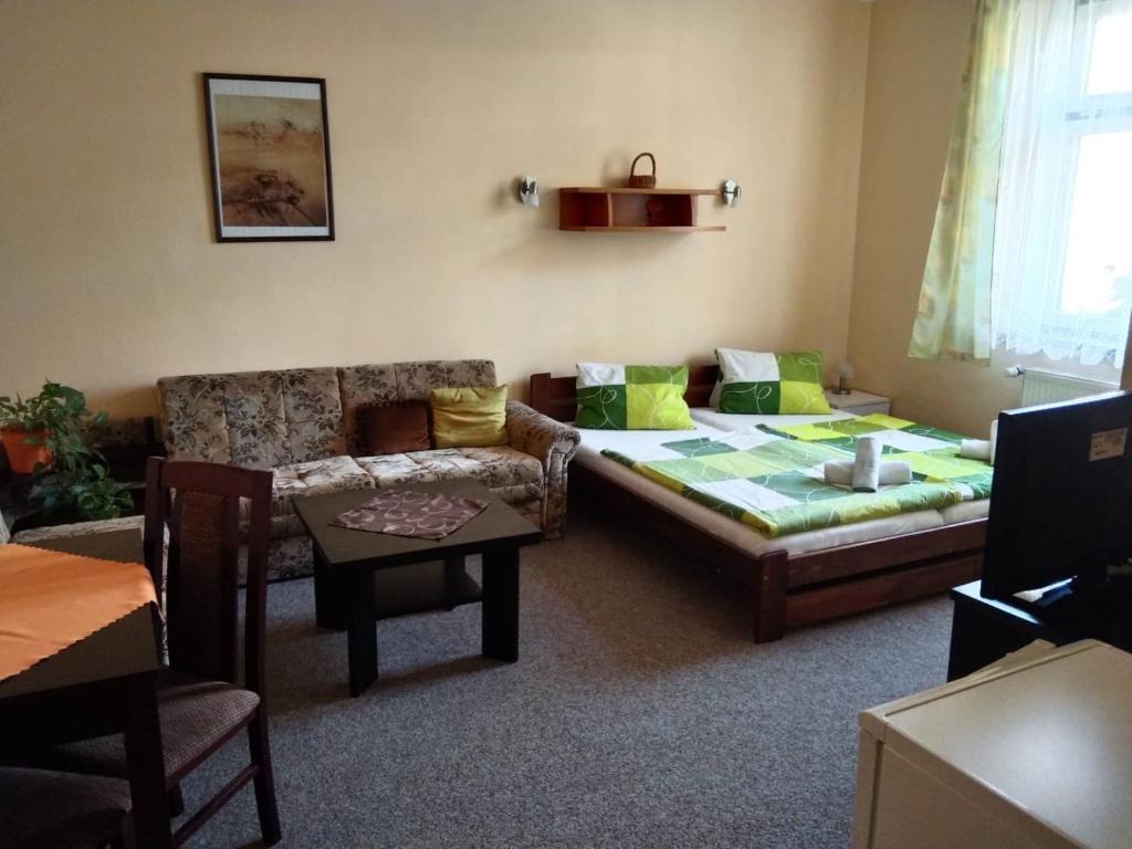 Postel nebo postele na pokoji v ubytování Hotel Jaro