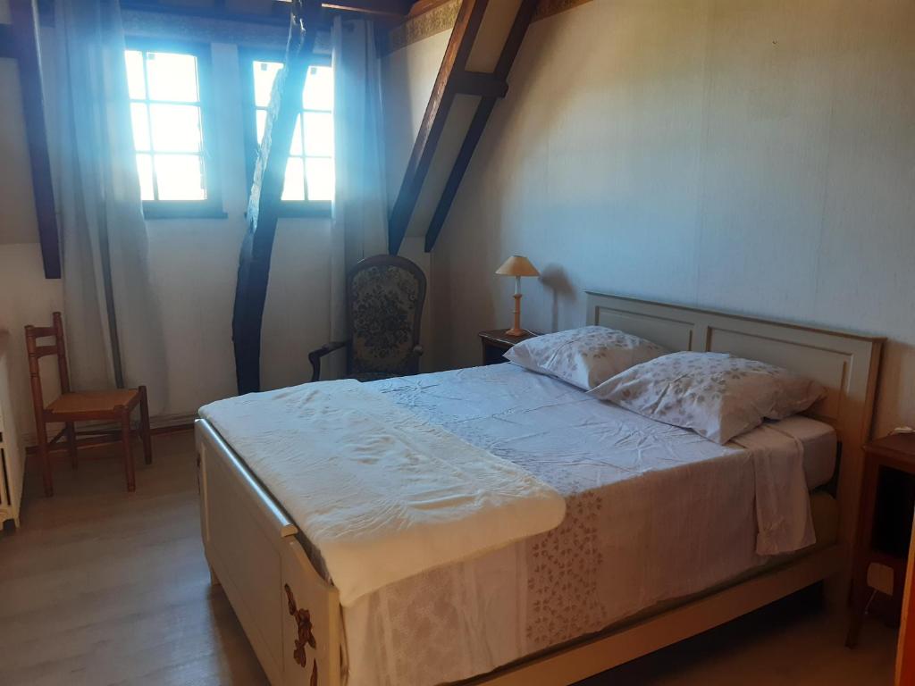 Posteľ alebo postele v izbe v ubytovaní CLOS PAGNY