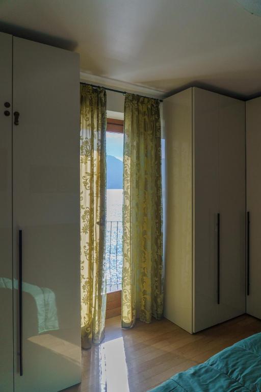Posteľ alebo postele v izbe v ubytovaní La Casetta Varenna