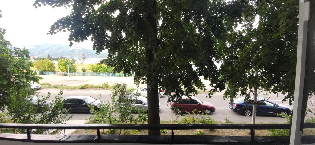 a group of cars parked in a parking lot at Casa TE apartment in Orşova