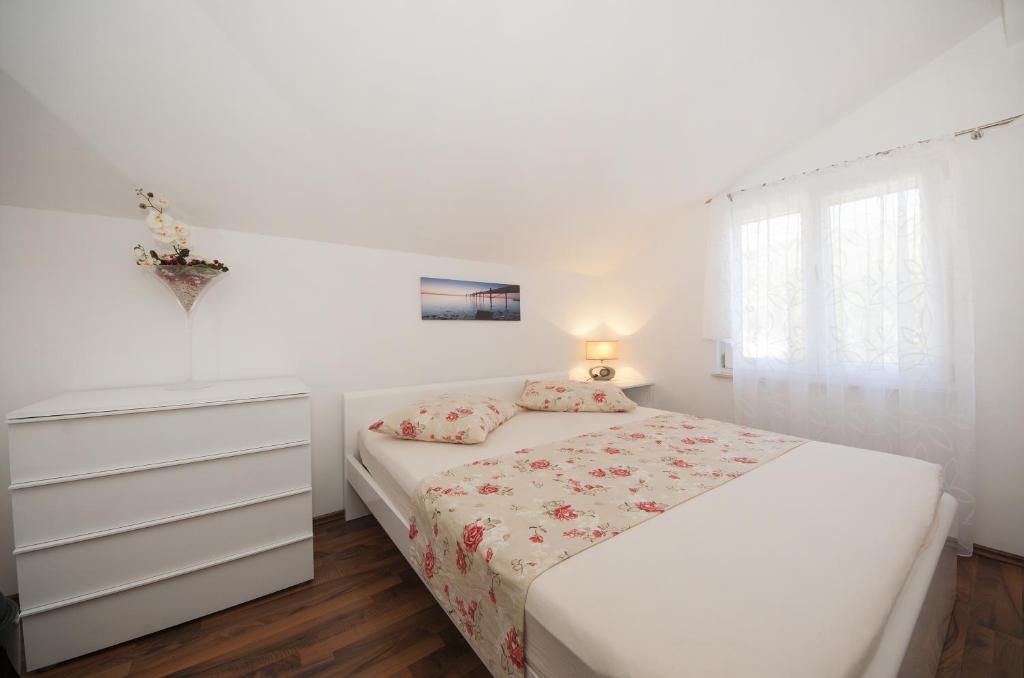 Postel nebo postele na pokoji v ubytování Guest House Loranum