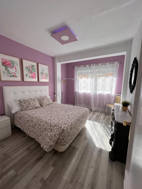 Katil atau katil-katil dalam bilik di Apartamento Caleta