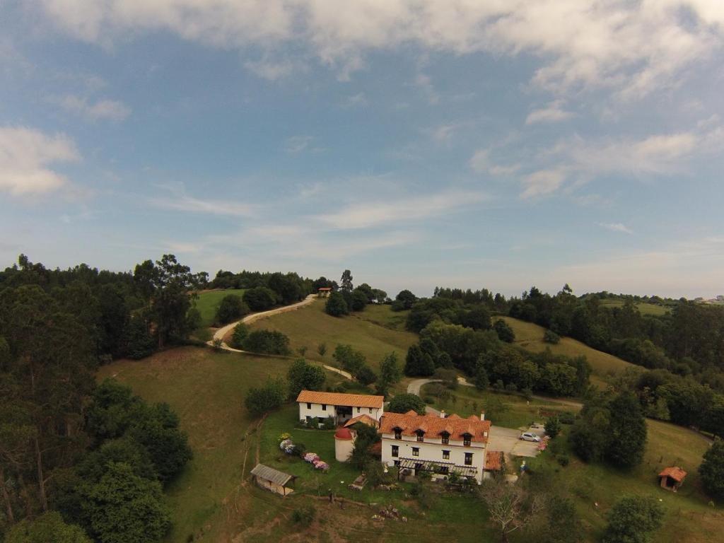 an aerial view of a house on a hill at Posada La Charola in Lamadrid