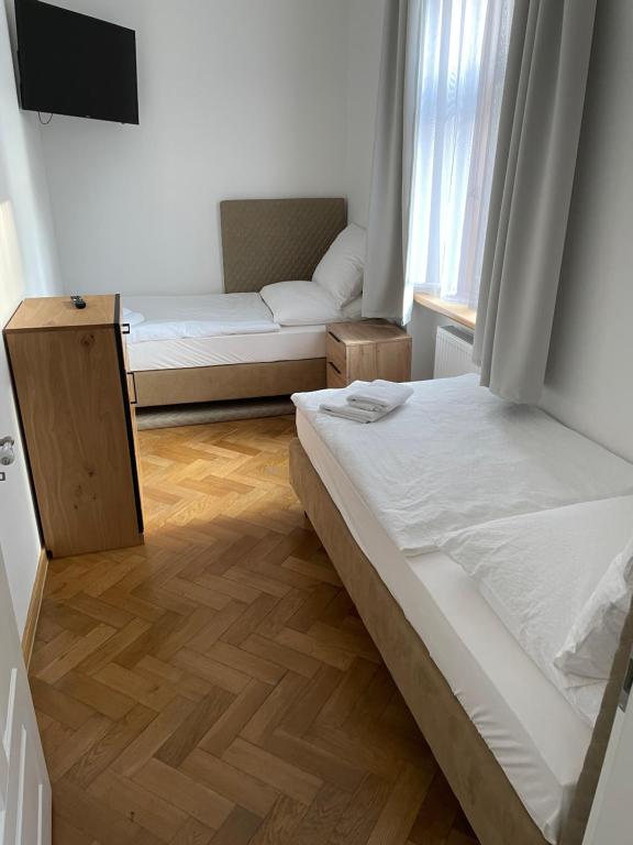 Postel nebo postele na pokoji v ubytování Villa Mila