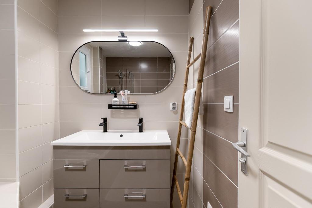 Kúpeľňa v ubytovaní Appartement spacieux 1 chambre parking gratuit
