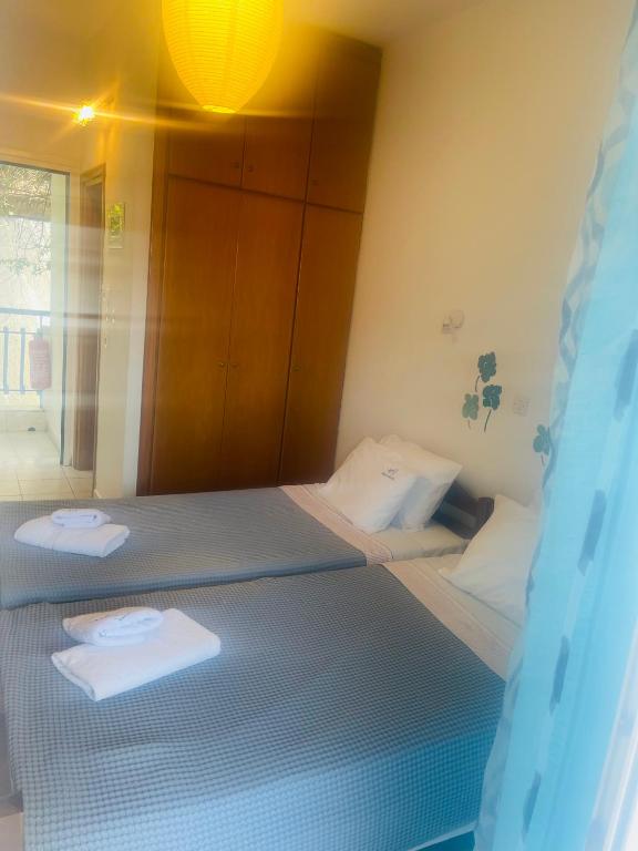 Postel nebo postele na pokoji v ubytování Pella Hotel - new
