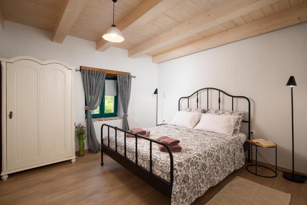 Posteľ alebo postele v izbe v ubytovaní House Eufemia