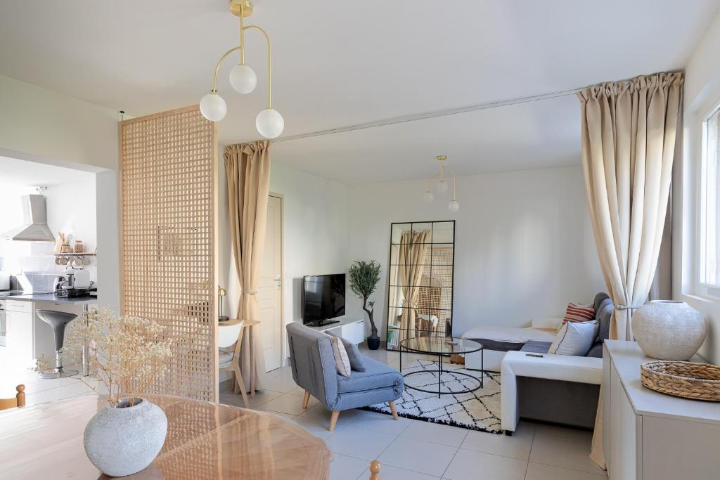 Posedenie v ubytovaní Appartement spacieux 1 chambre parking gratuit