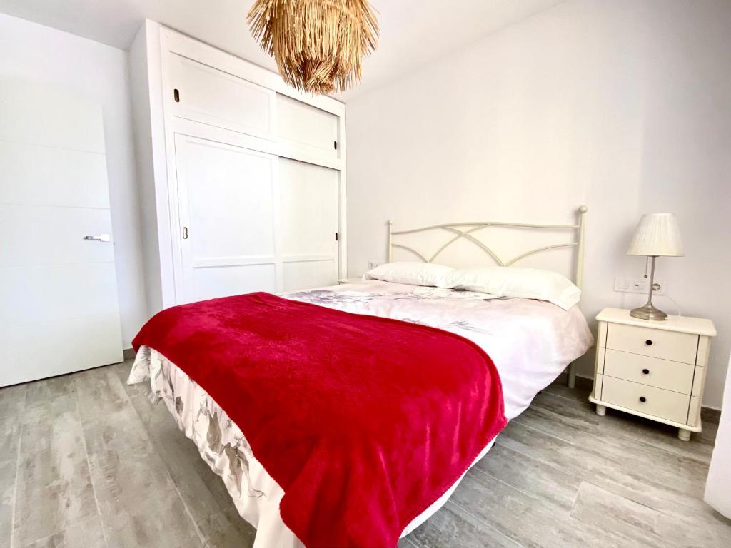 Postel nebo postele na pokoji v ubytování Modern apartment with sea views in Corralejo