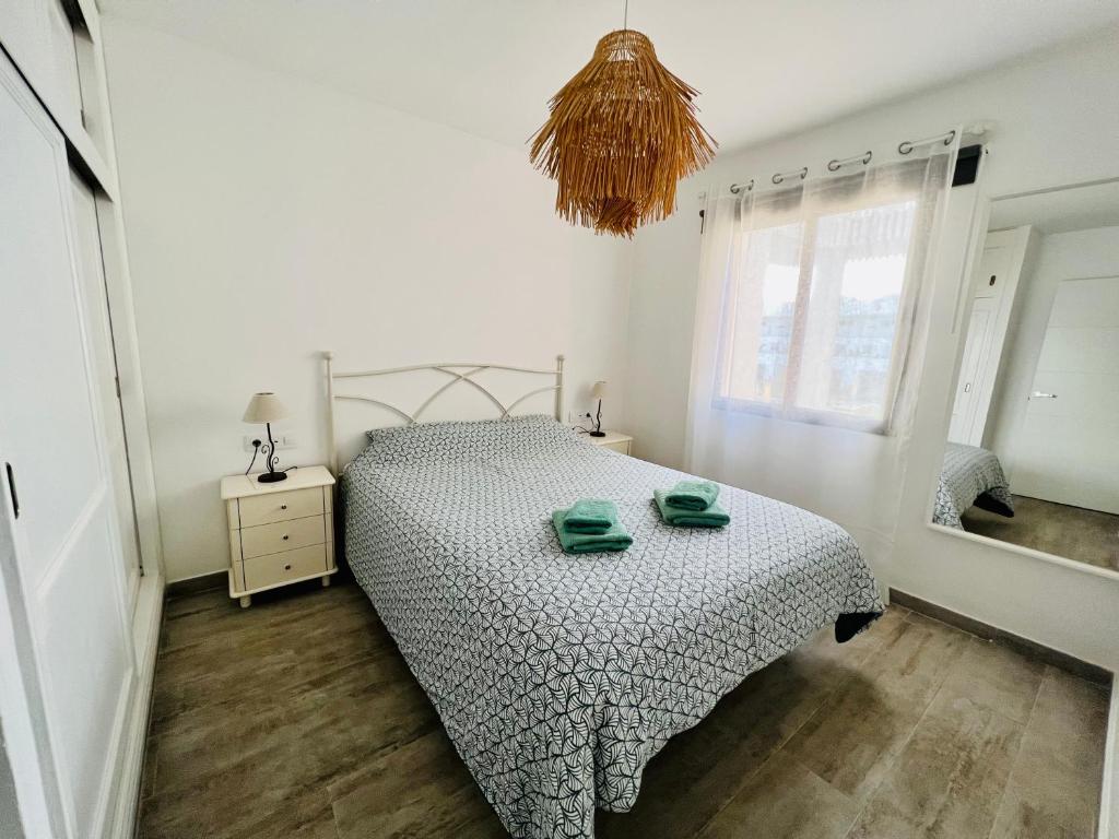 Postel nebo postele na pokoji v ubytování Modern apartment with sea views in Corralejo