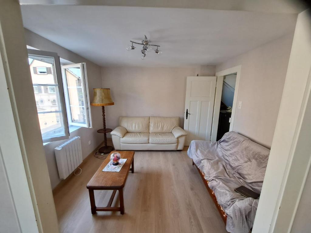 Posezení v ubytování Gîte Faubourg des Pierres