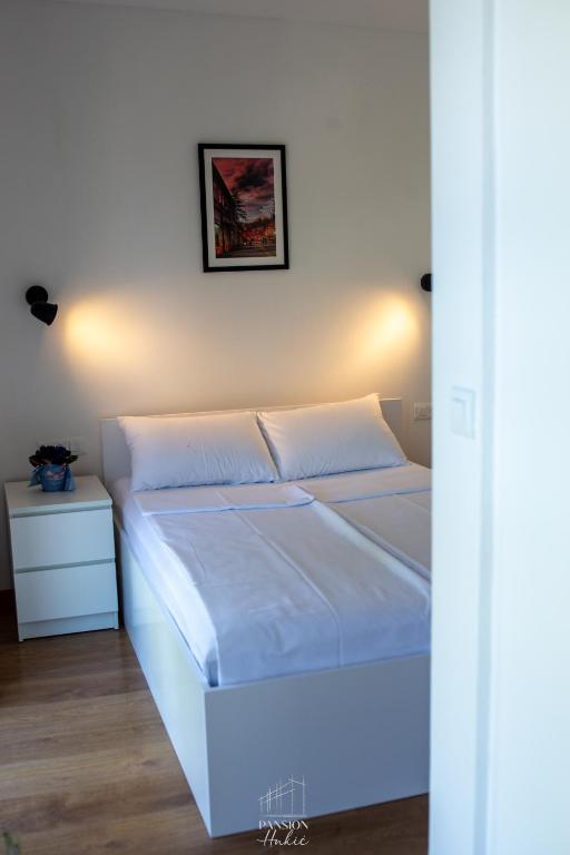 Postel nebo postele na pokoji v ubytování Pansion Hukić B&B