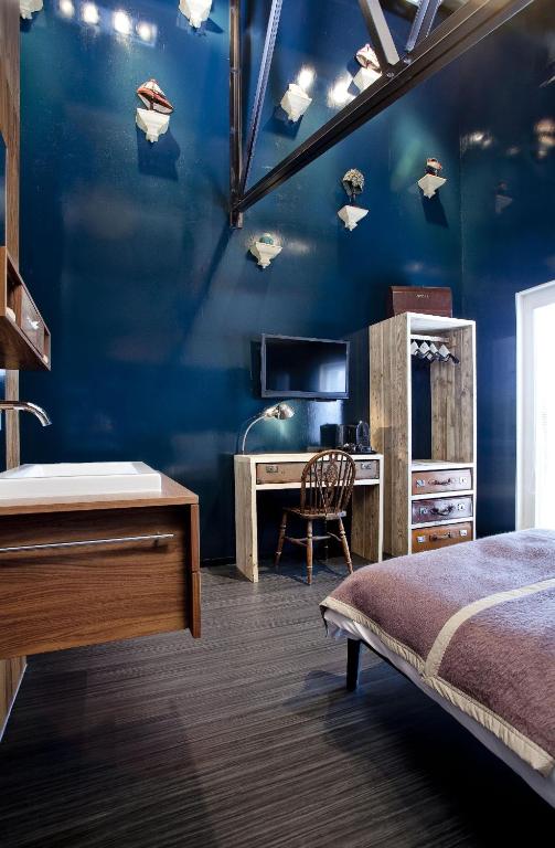 Postel nebo postele na pokoji v ubytování Design Hotel Modez