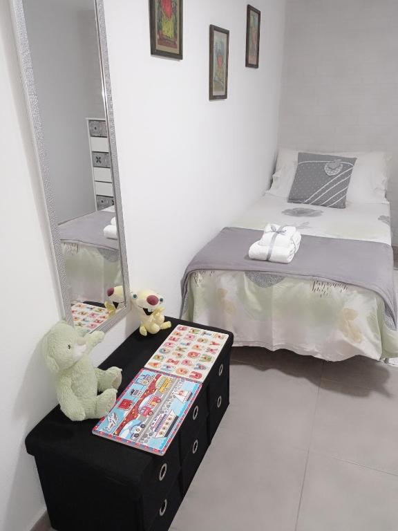 A bed or beds in a room at Casa Fortu La Palma