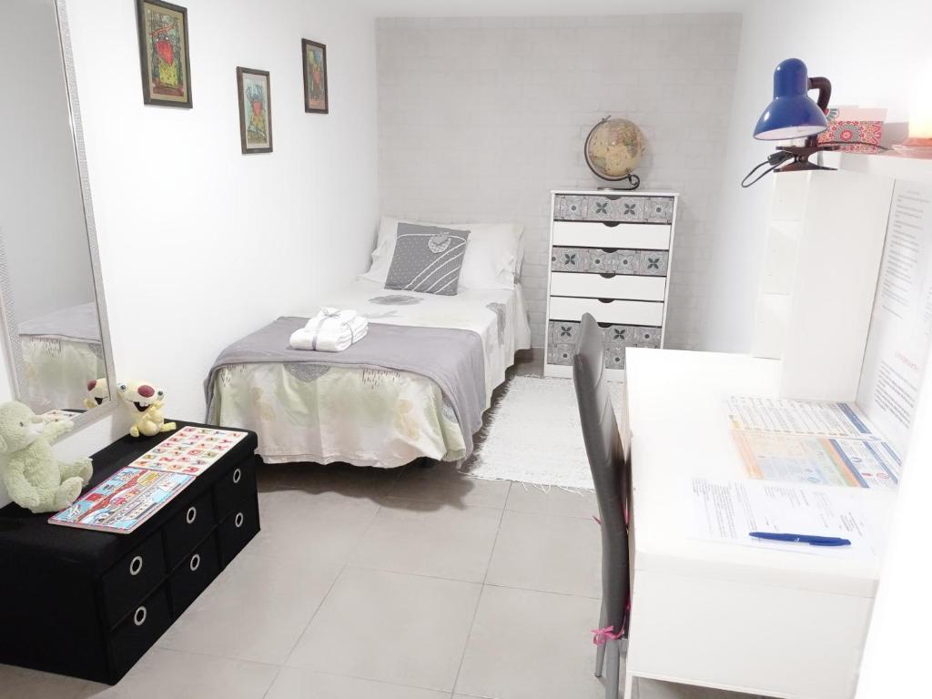 A bed or beds in a room at Casa Fortu La Palma
