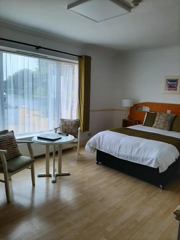 Postel nebo postele na pokoji v ubytování Abacus Guesthouse