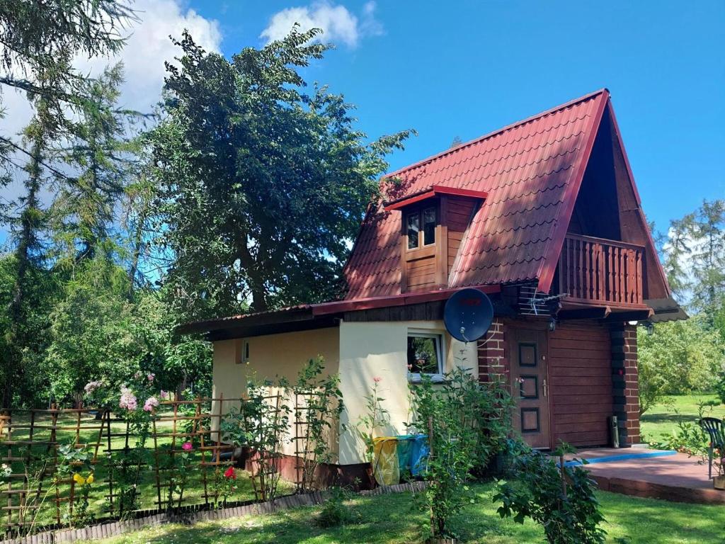 a small house with a red roof at holiday home, Kolczewo in Kołczewo