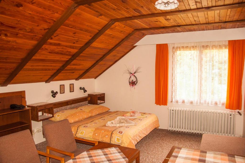 Postel nebo postele na pokoji v ubytování Privát - Harrachov 392