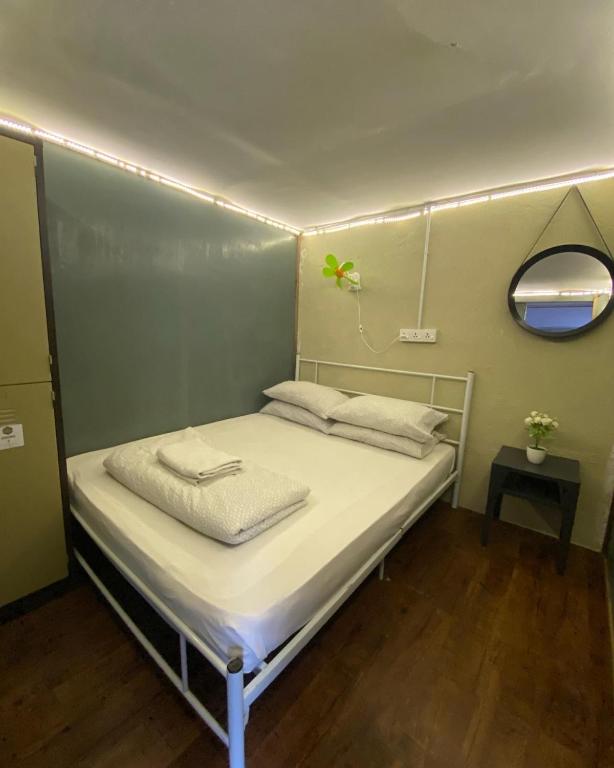 Postel nebo postele na pokoji v ubytování Hikers Sleep Port Guesthouse