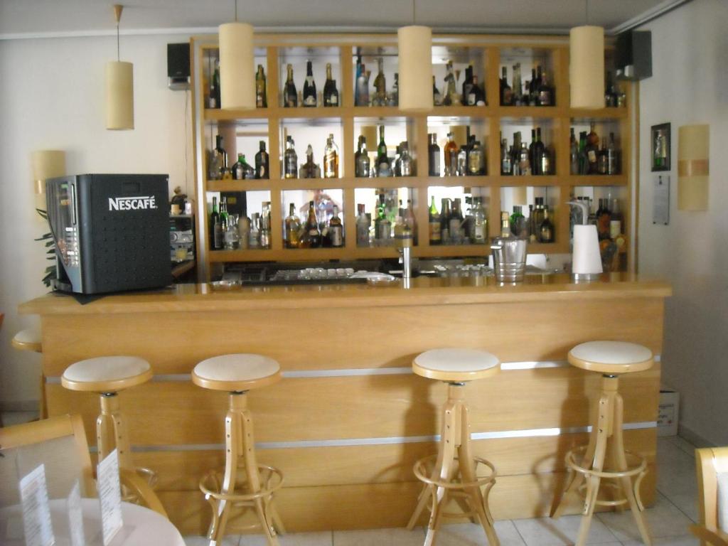 Lounge nebo bar v ubytování Iris Hotel