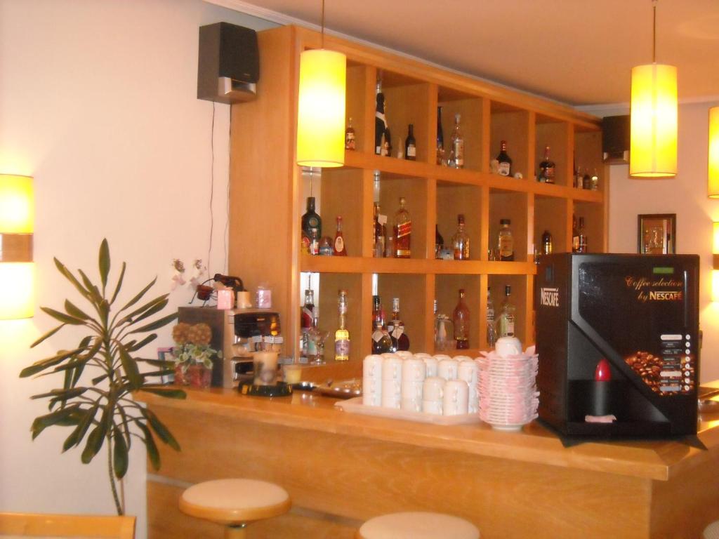 Lounge nebo bar v ubytování Iris Hotel