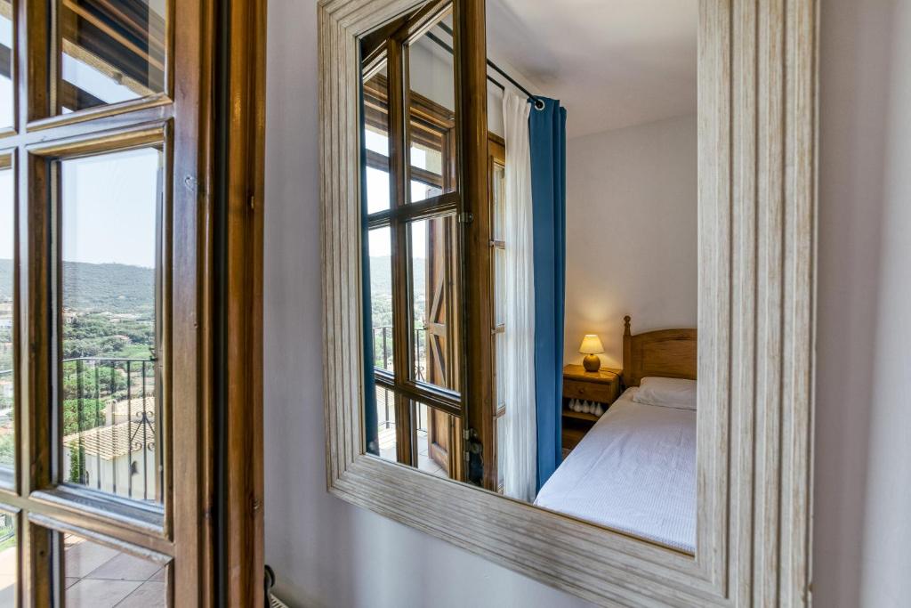 Postel nebo postele na pokoji v ubytování Castell Mirto - villa private pool